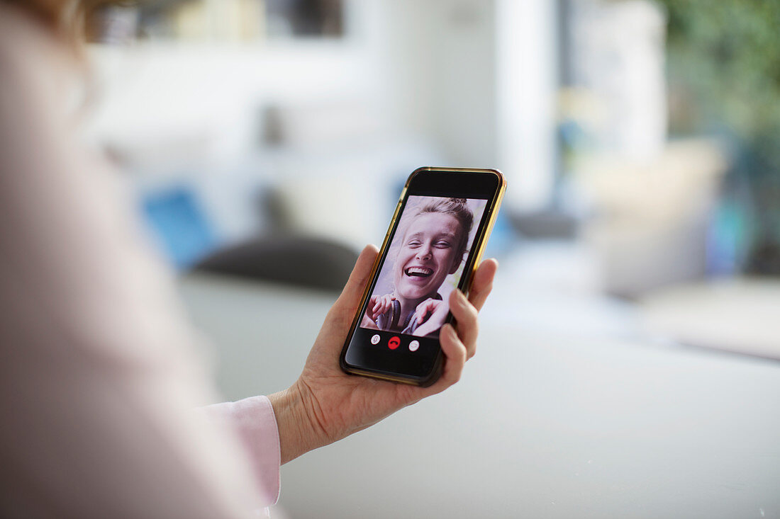 Happy women video chatting with smart phone