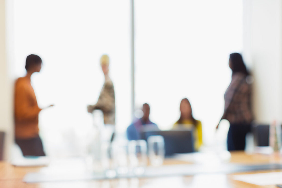 Business people in conference room meeting