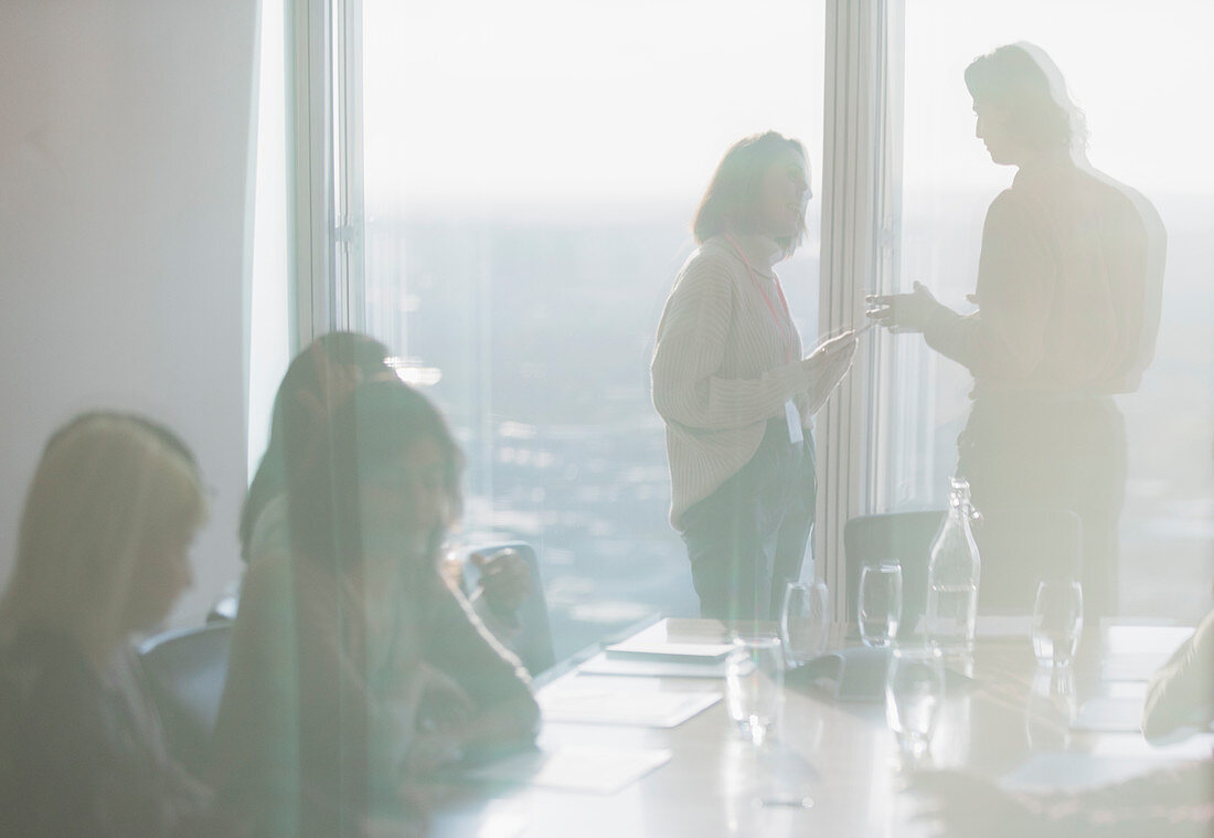 Business people talking in conference room meeting