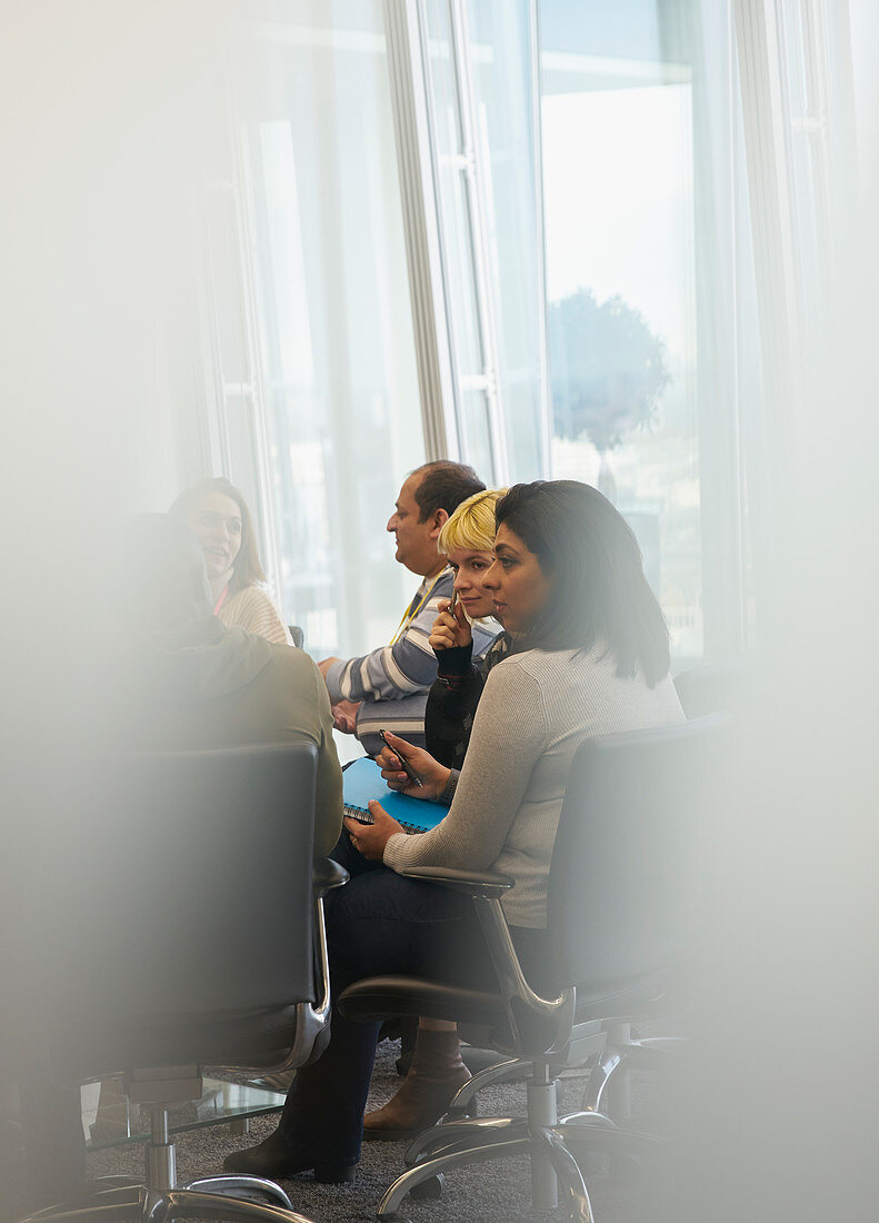 Business people talking in conference room meeting