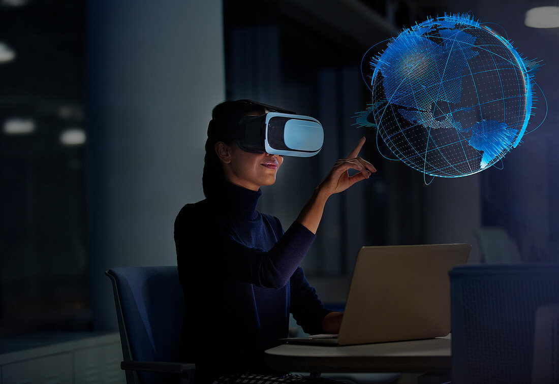Businesswoman with VR glasses touching globe