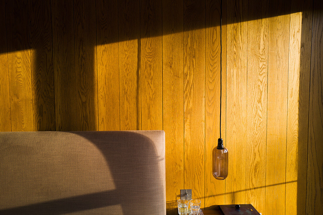 Sunlight over wood panelling