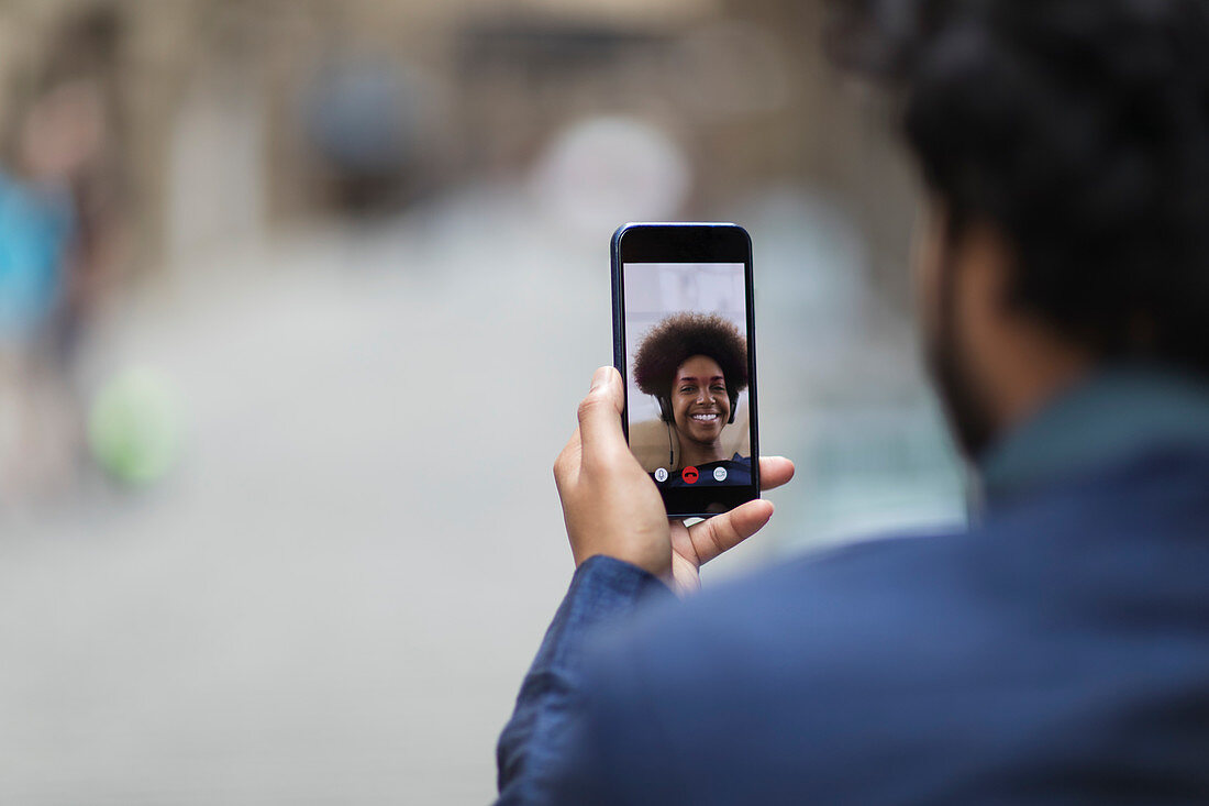 Man video chatting with woman