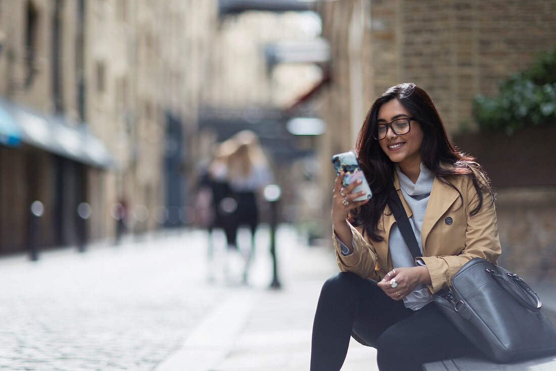 Businesswoman using smart phone