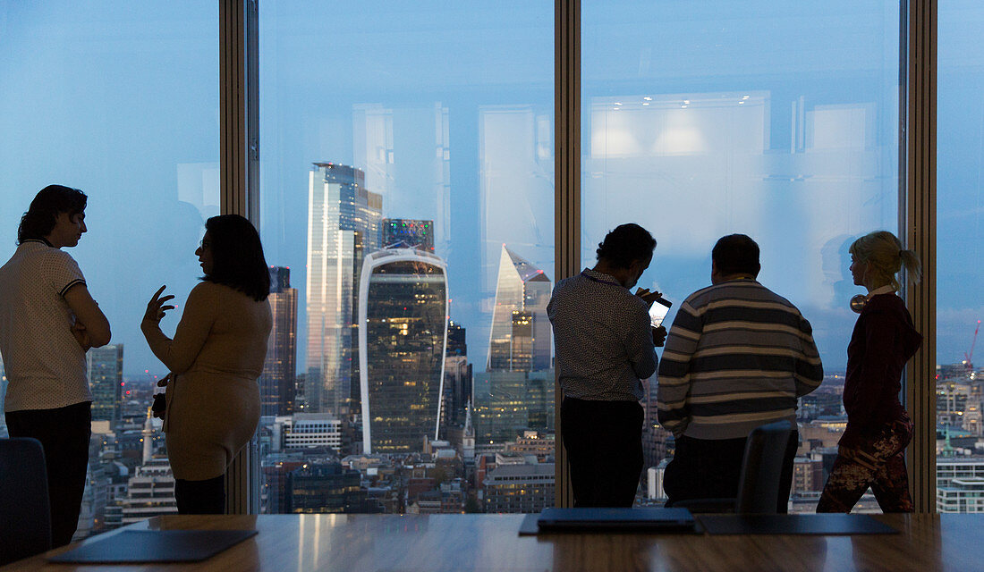 Business people talking, London, UK