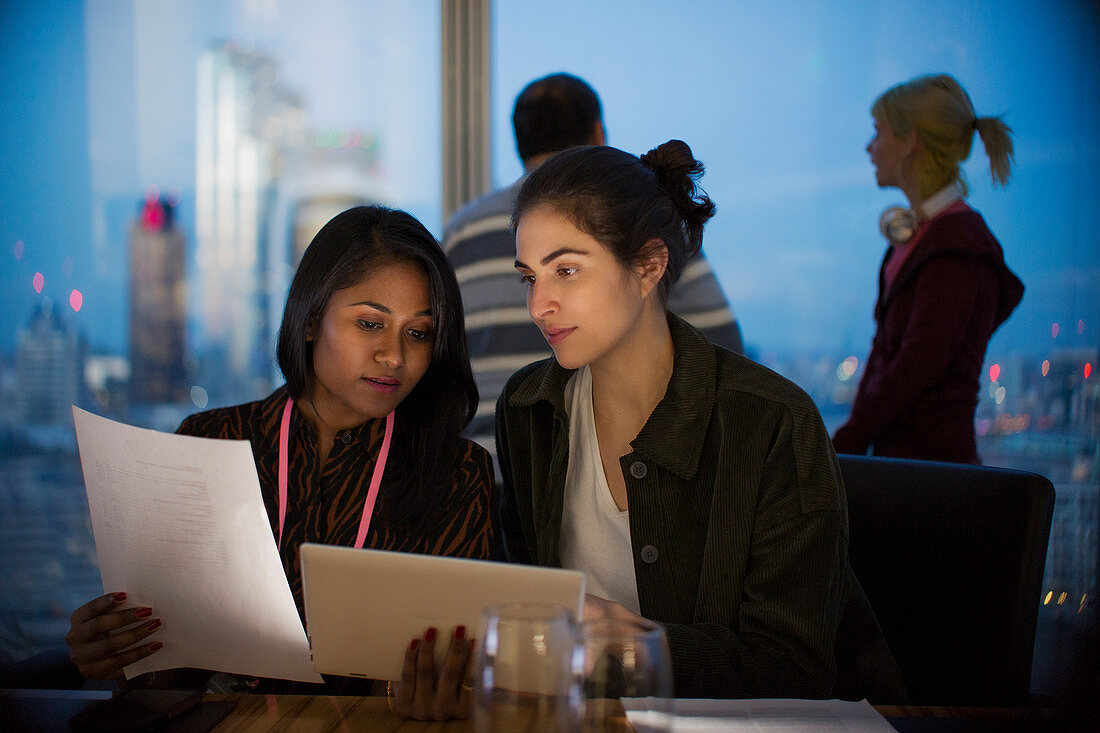 Businesswomen with tablet in office