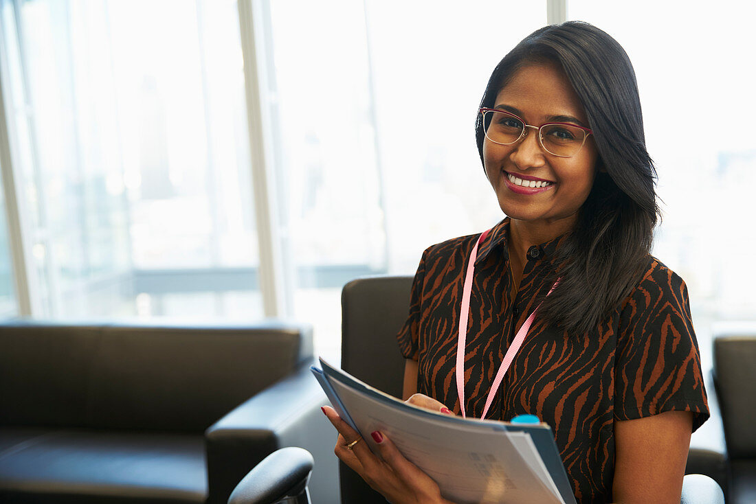 Portrait Businesswoman with paperwork