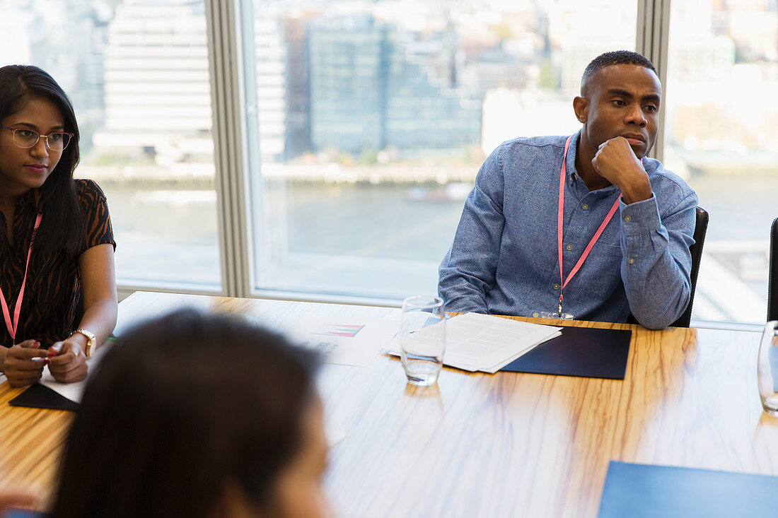 Attentive businessman listening meeting