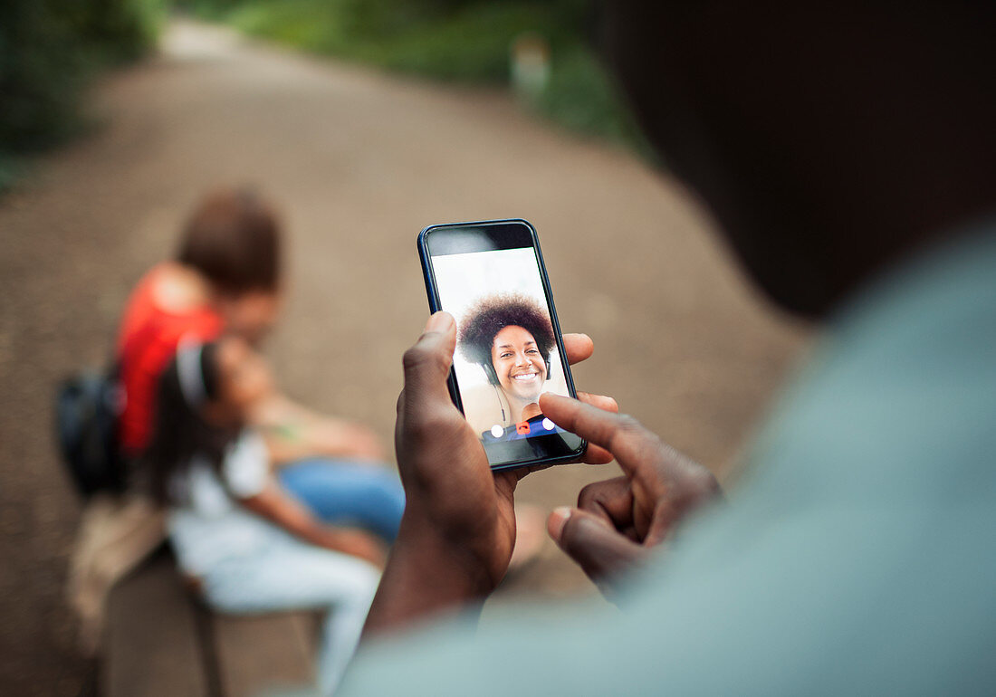 Man video chatting with woman