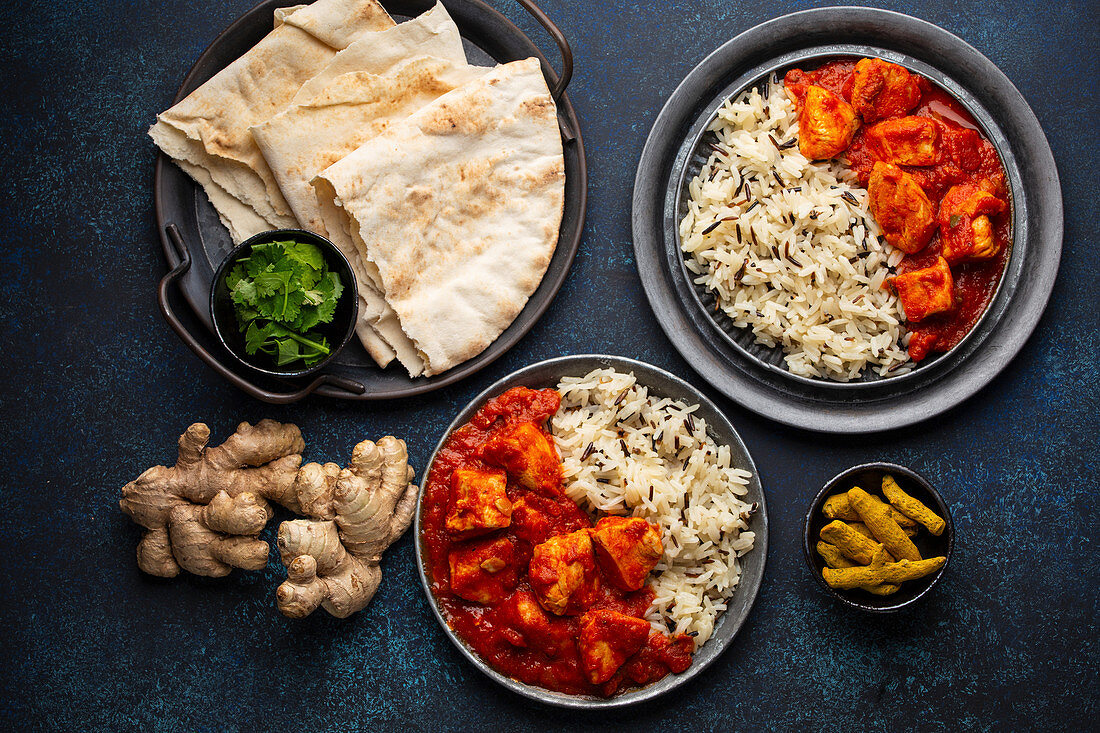 Indian chicken tikka masala dish with rice