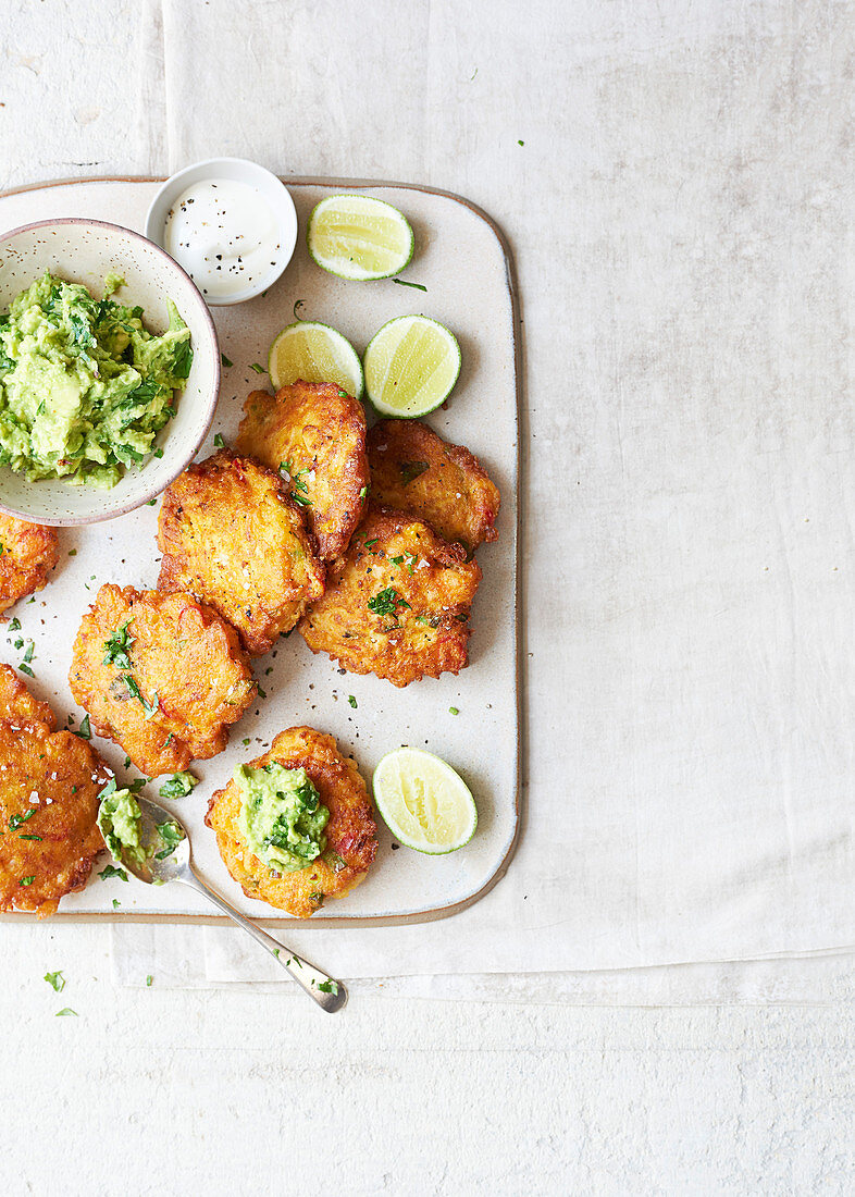 Chipotle, corn and prawn fritters with avocado puree
