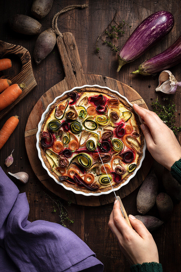 Rainbow vegetable tart with carrots, zucchini, aubergine and beetroot