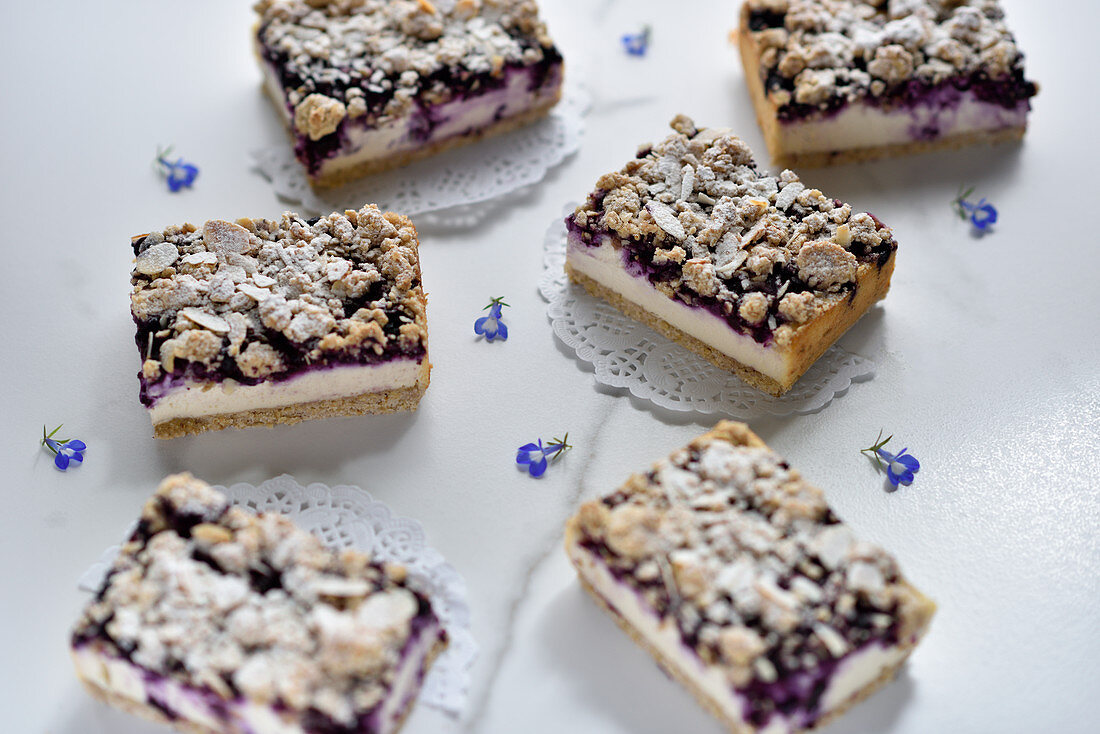 Vegan marzipan and blueberry cheesecake with almond crumbles