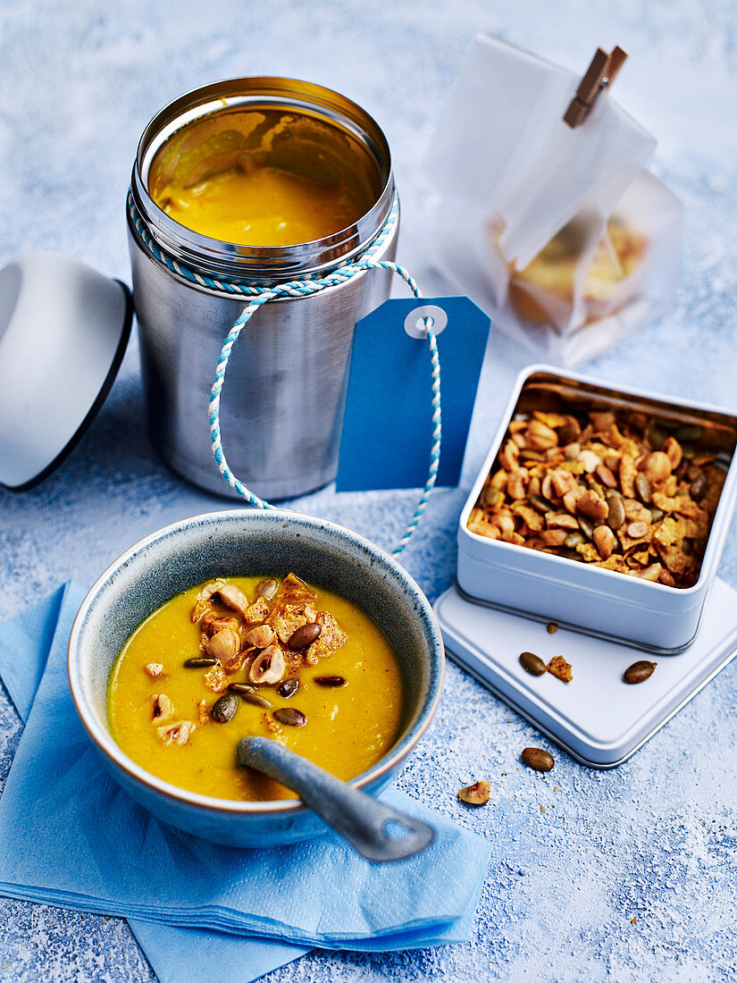 Carrot and hazelnut soup with lunch box crunch