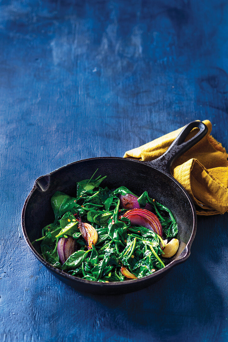 Seared spinach with red onions