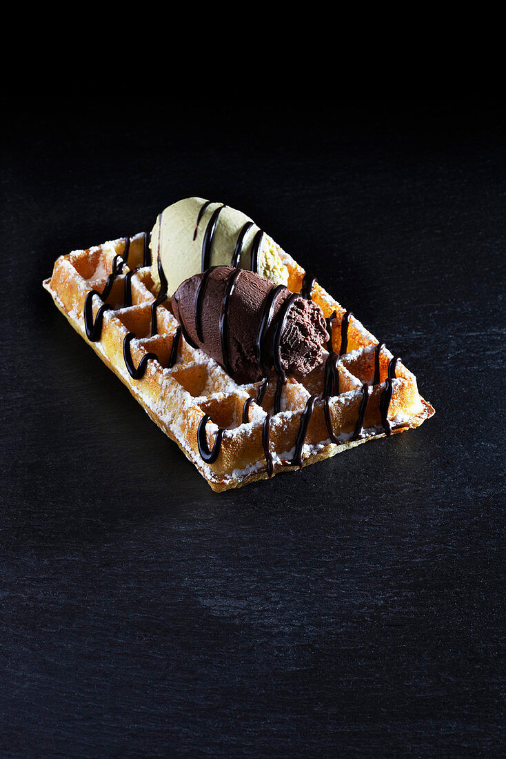 A waffle with dark and white chocolate mousse