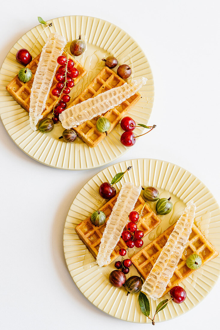 Waffles, berries and honey for breakfast