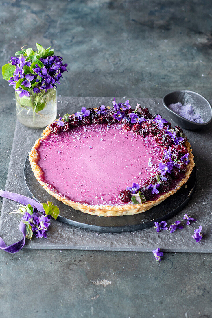 Wild violet pie with berry filling