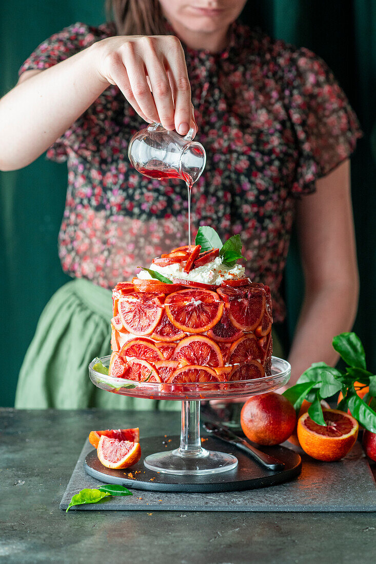 Blood orange cake with butter cream and fresh blood oranges