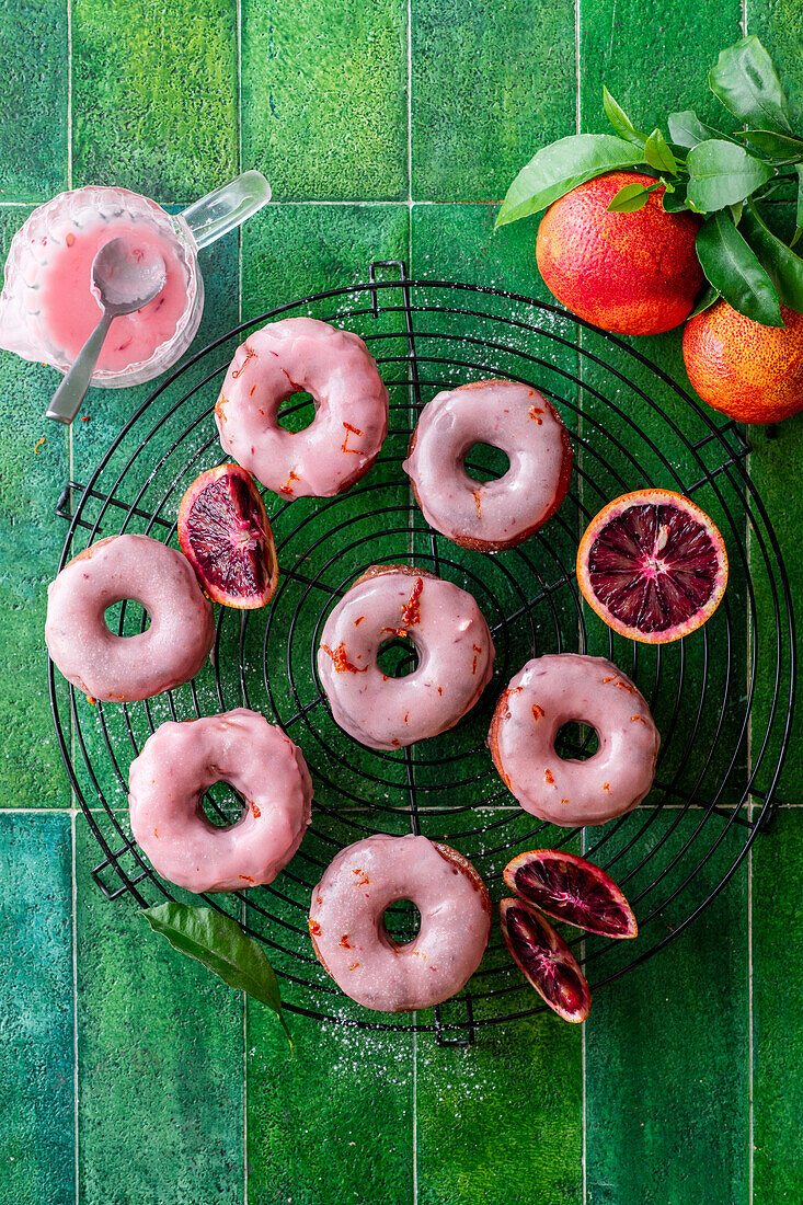 Glazed blood orange donuts