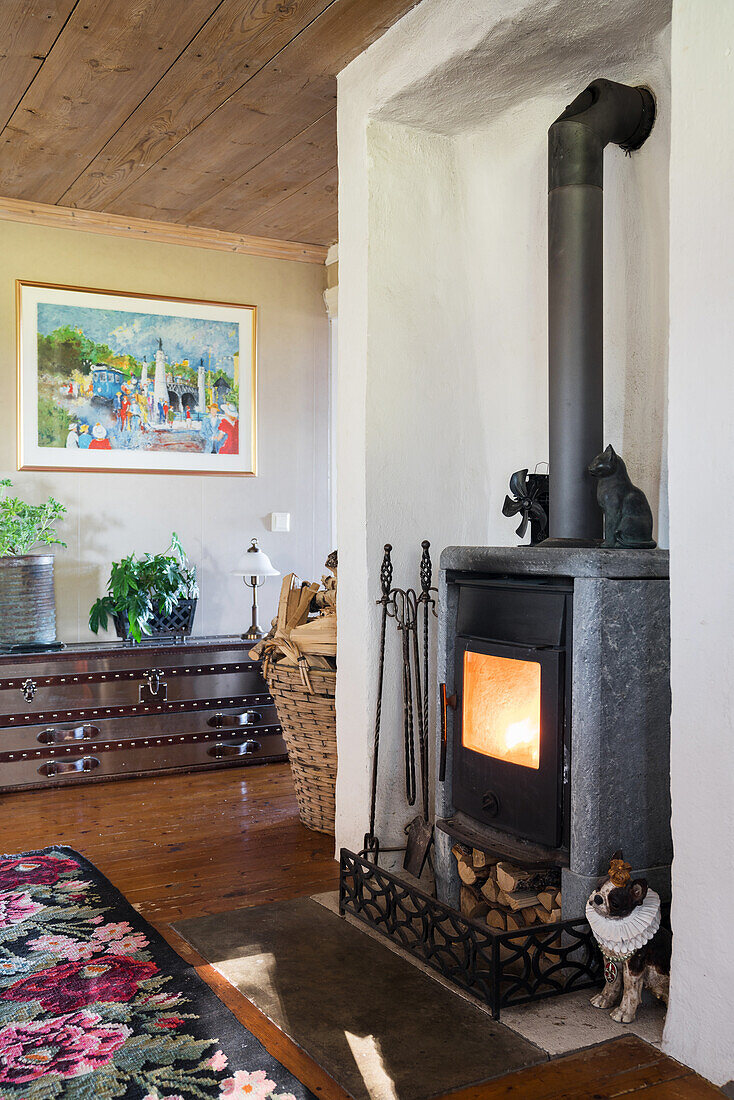 A wood-burning stove in a rural-style living room