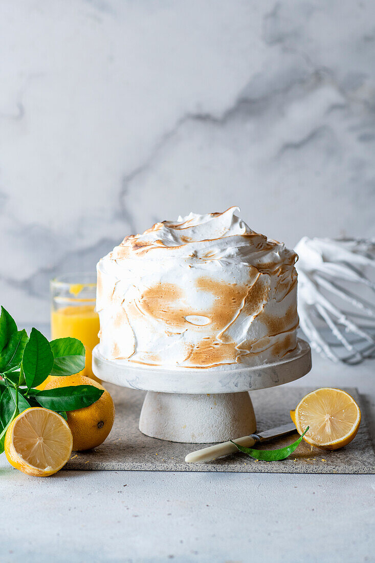 Lemon meringue cake made with poppy seeds and lemon curd