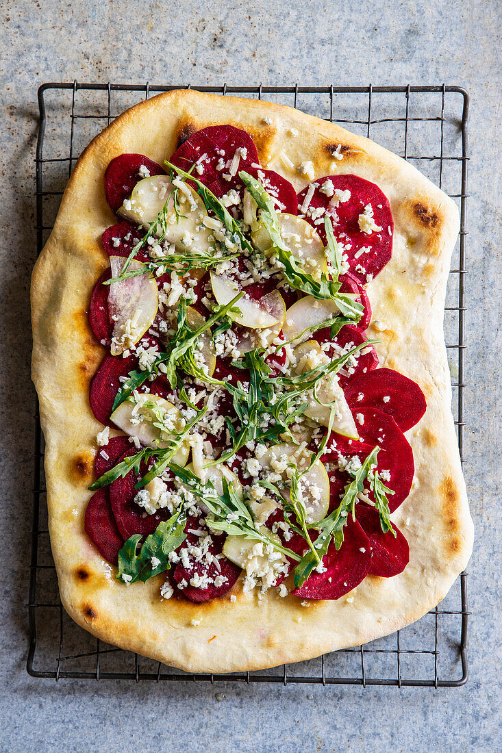 Beetroot and rocket carpaccio pizza