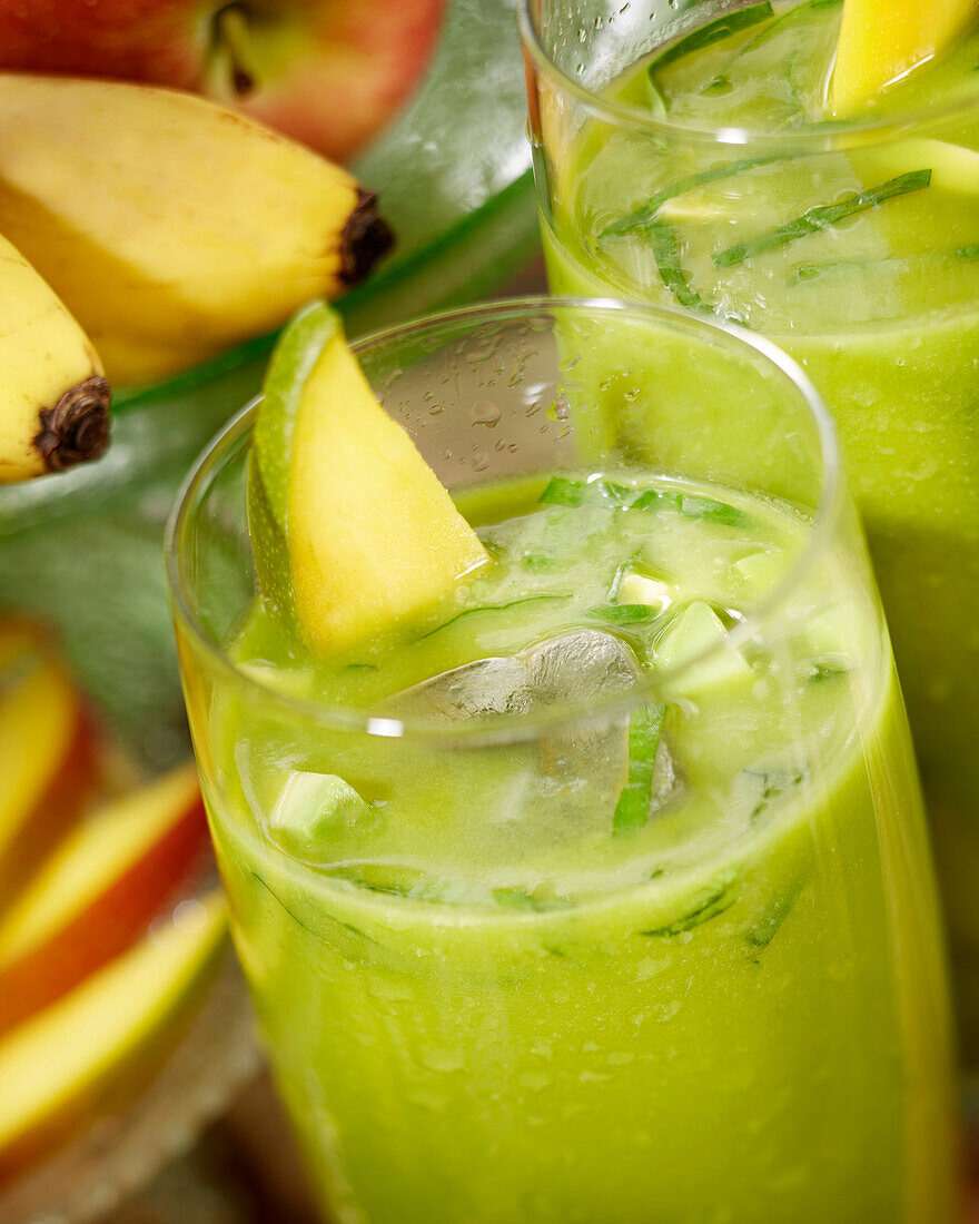 Smoothie with mango, avocado, apple, banana and spinach