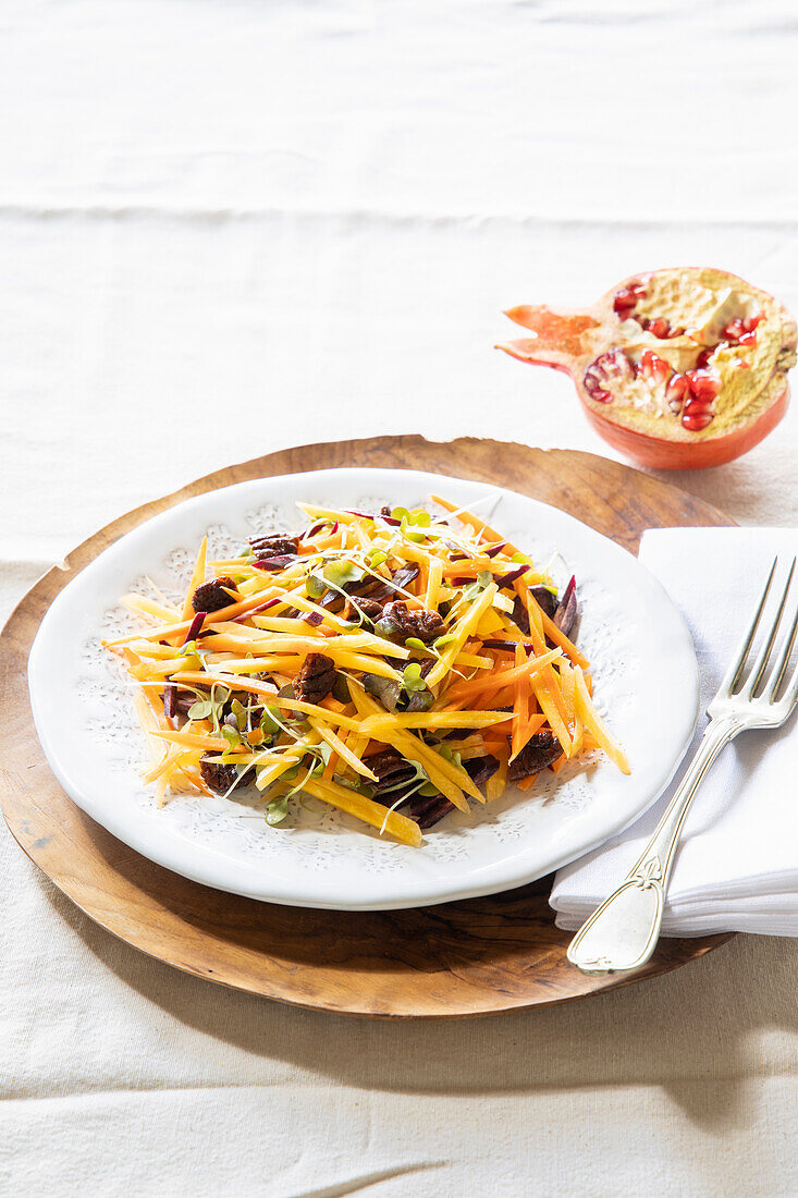 Colourful carrot and pecan salad