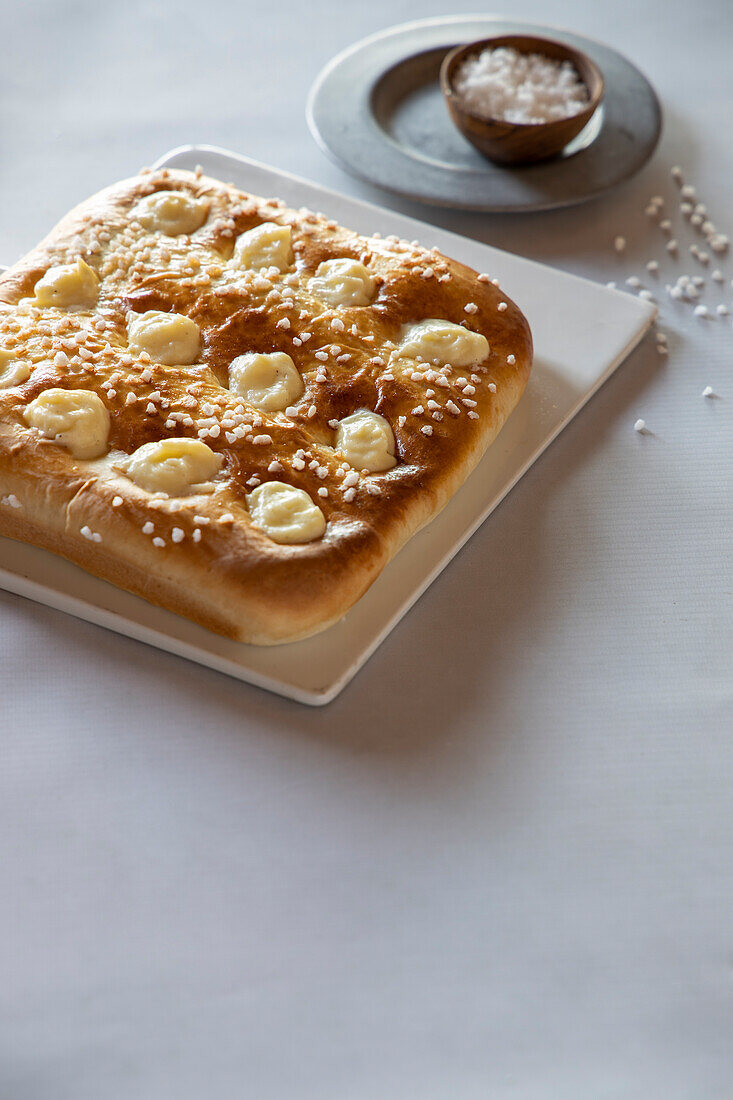 Sweet focaccia filled with vanilla cream