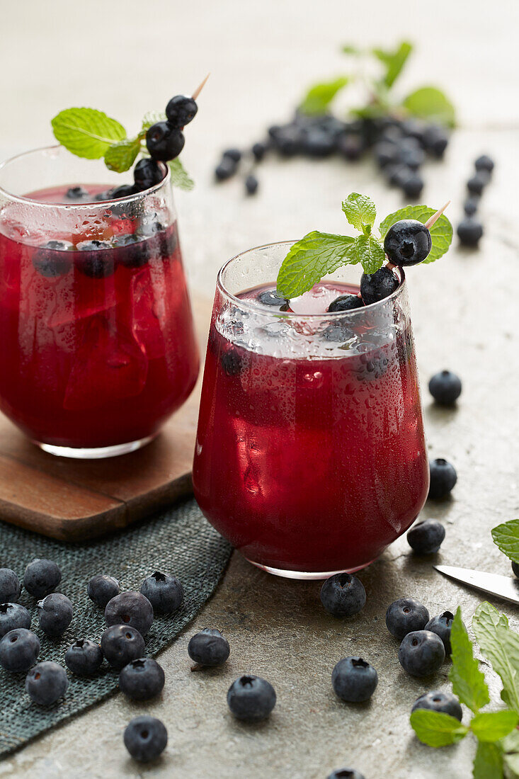 Blueberry juice with ice cubes