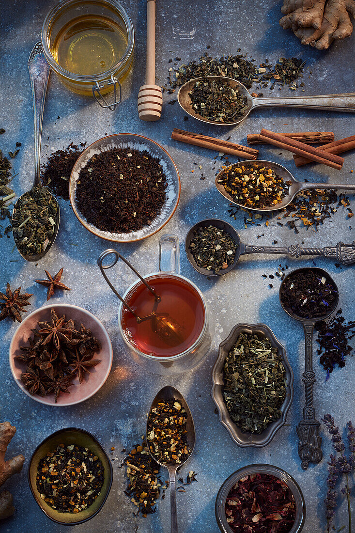 Various teas on spoons and in bowls