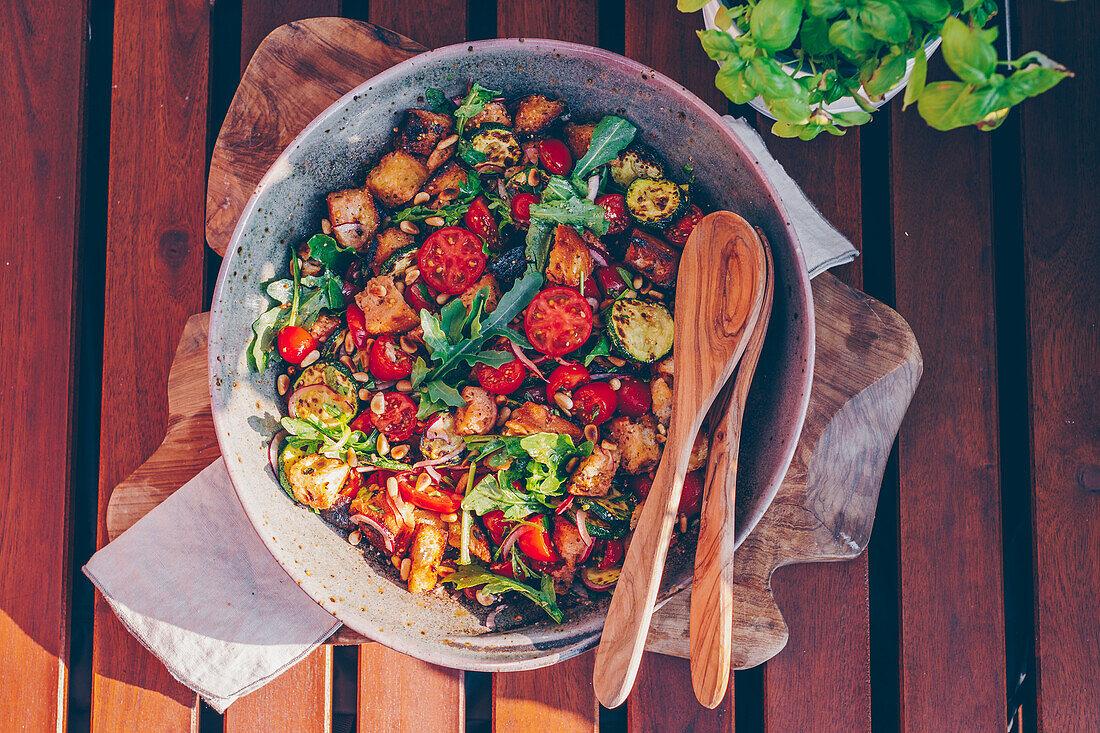 Bread salad (panzanella) with grilled zucchini