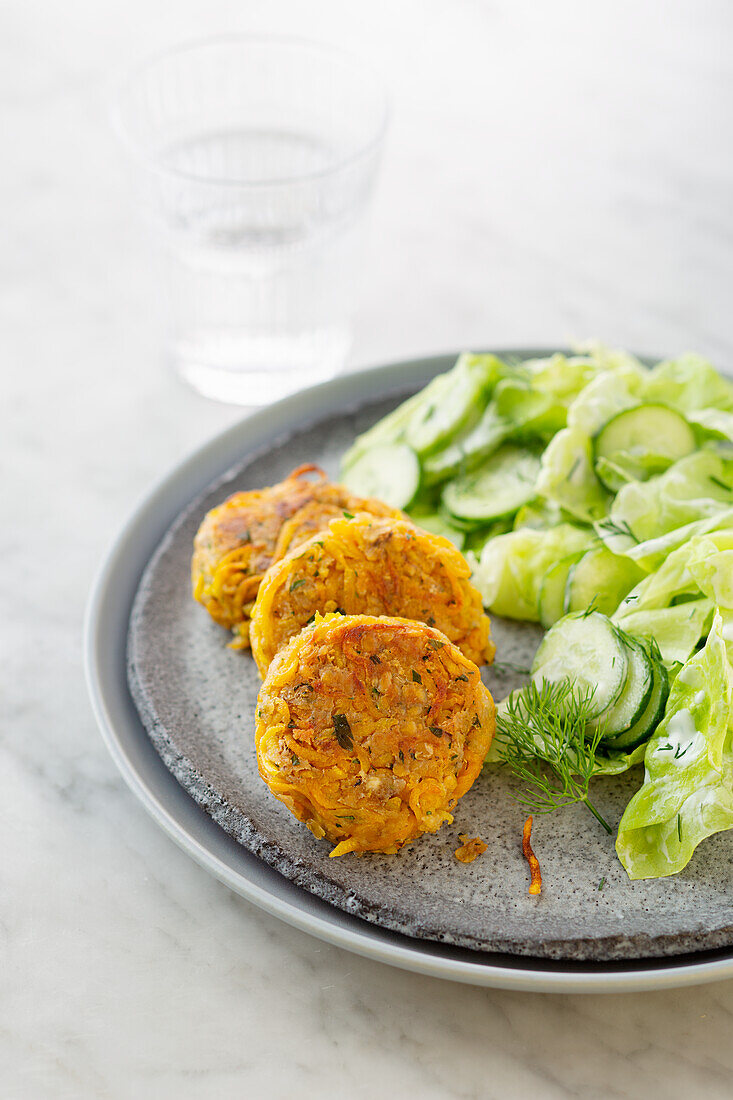 Pumpkin and lentil meatballs with cucumber salad