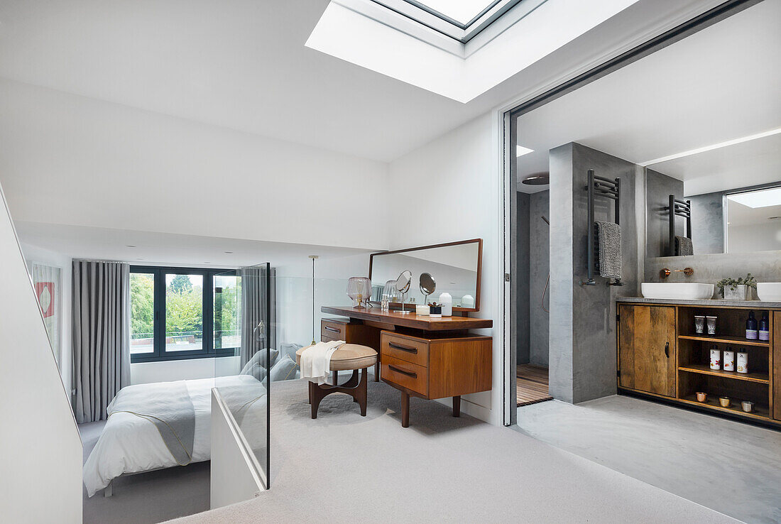 Ensuite bathroom and dressing on mezzanine level, stairs leading to sleeping area