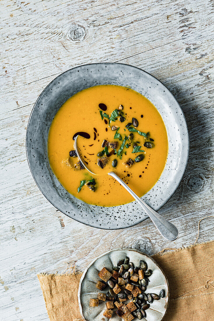Pumpkin and coconut soup with croutons