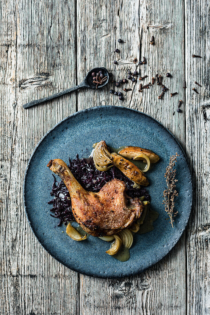 Duck legs with grapes and red cabbage