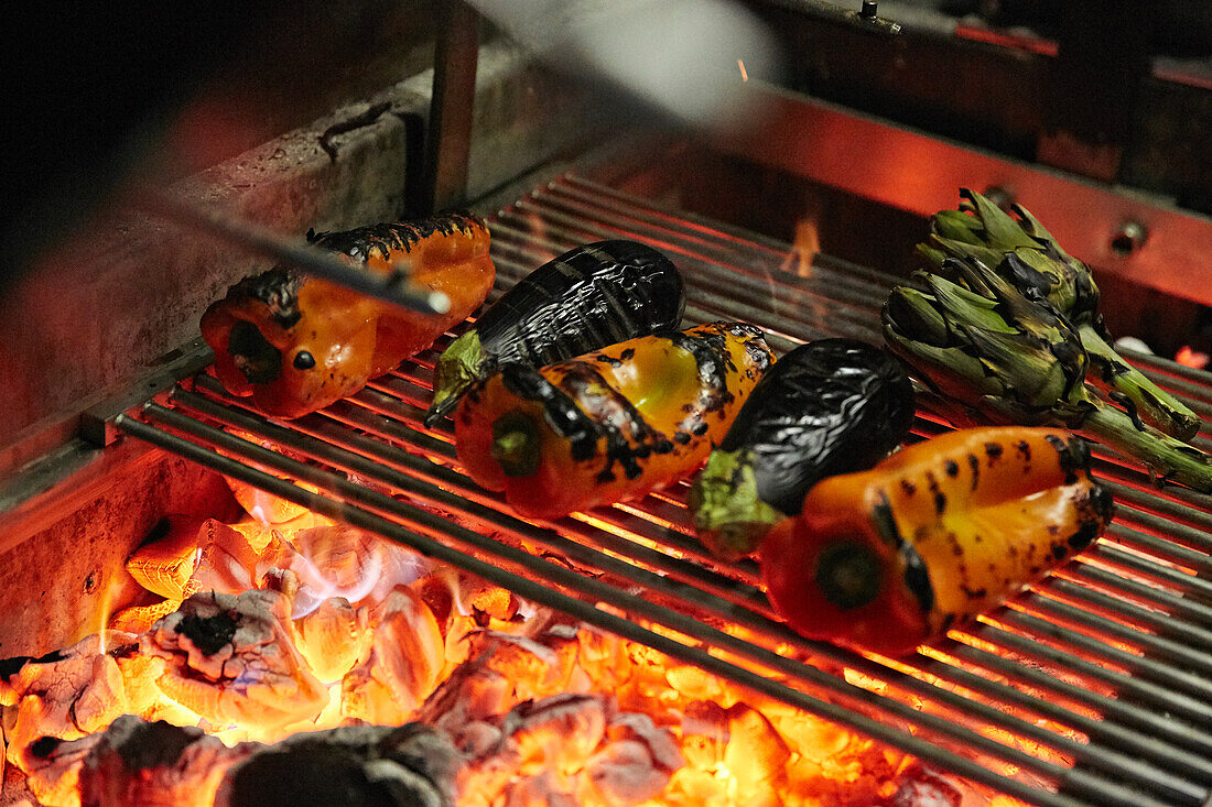 Roast vegetables over a fire