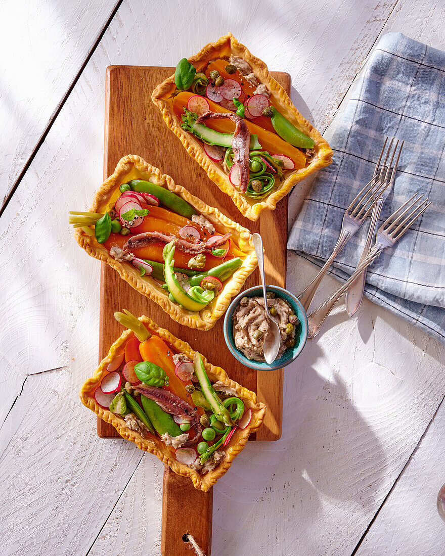 Anchovy and vegetable tarts