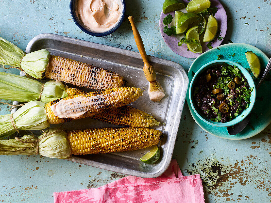Smoky grilled corn on the cob with bean puree