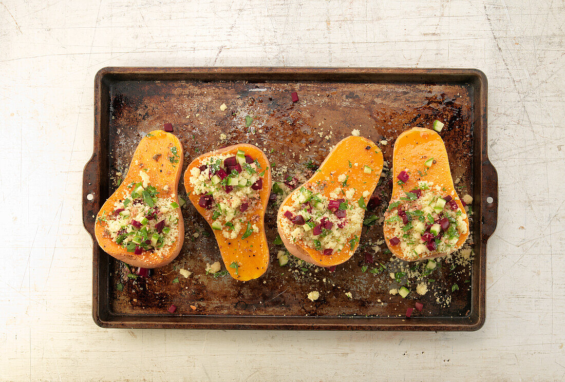 Couscous beet salad in roasted butternut squash