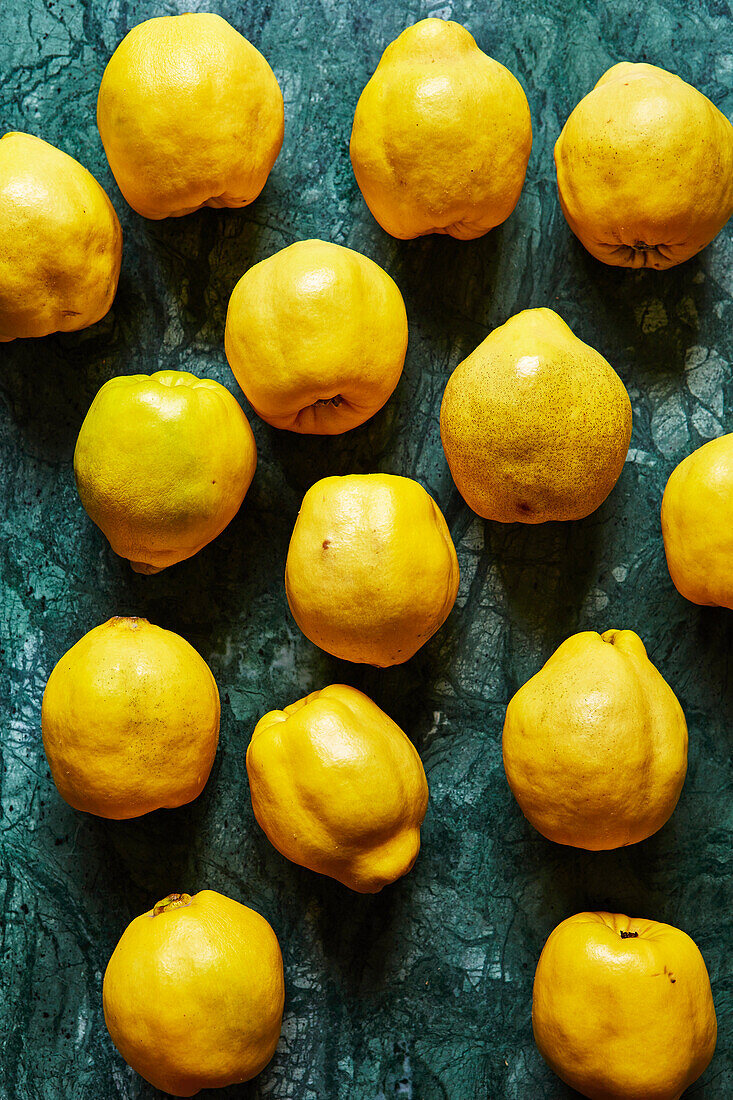 Quinces on a green background