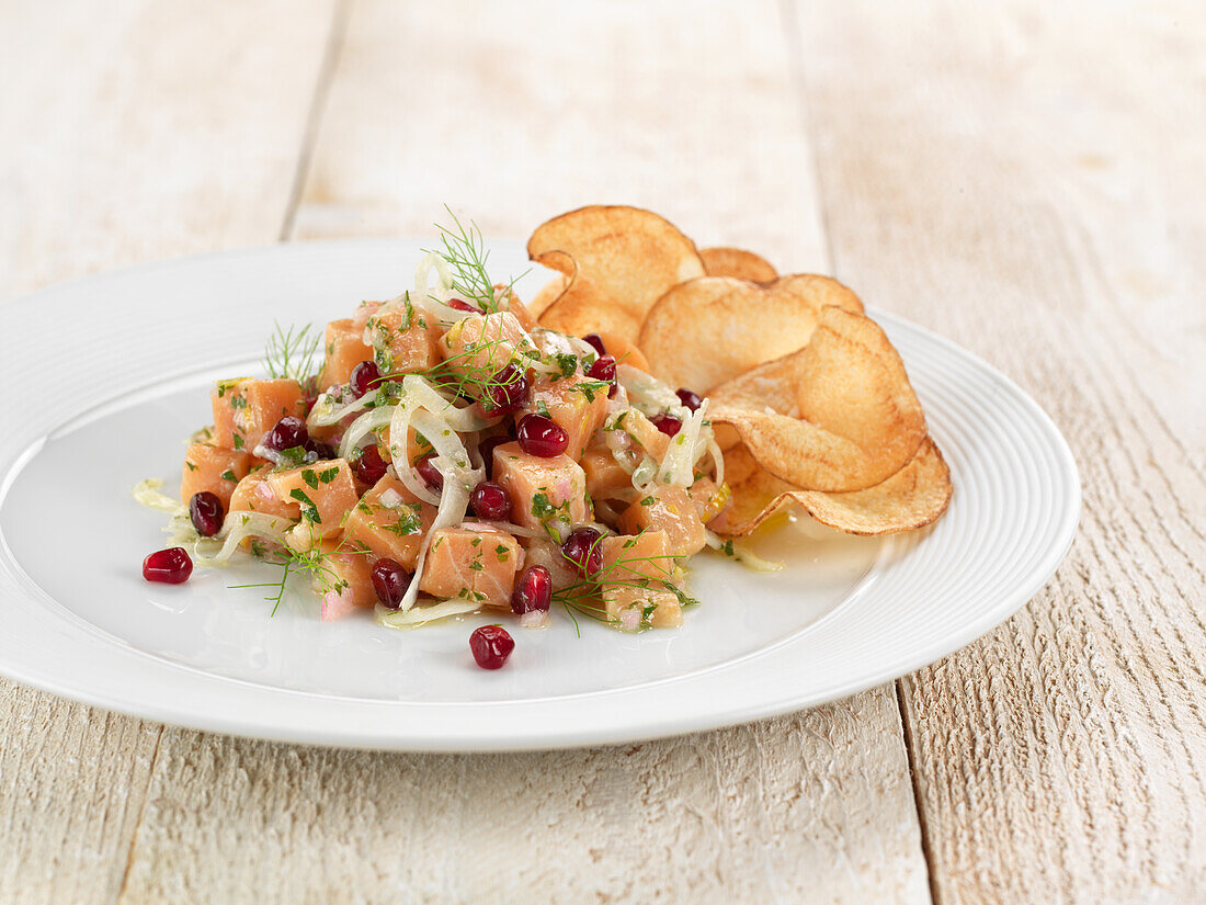 Fennel and salmon poke with pomegranate seeds