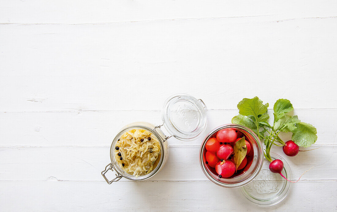 Homemade sauerkraut, fermented radishes