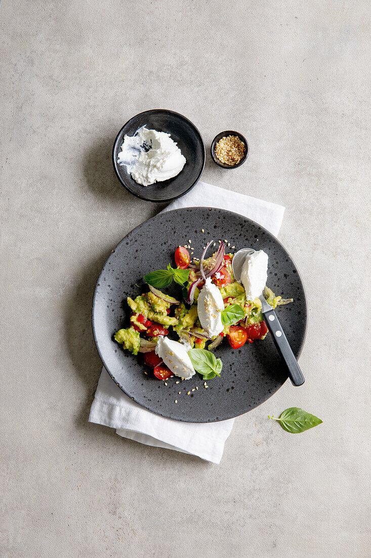 Mashed avocado with goat cheese dumplings