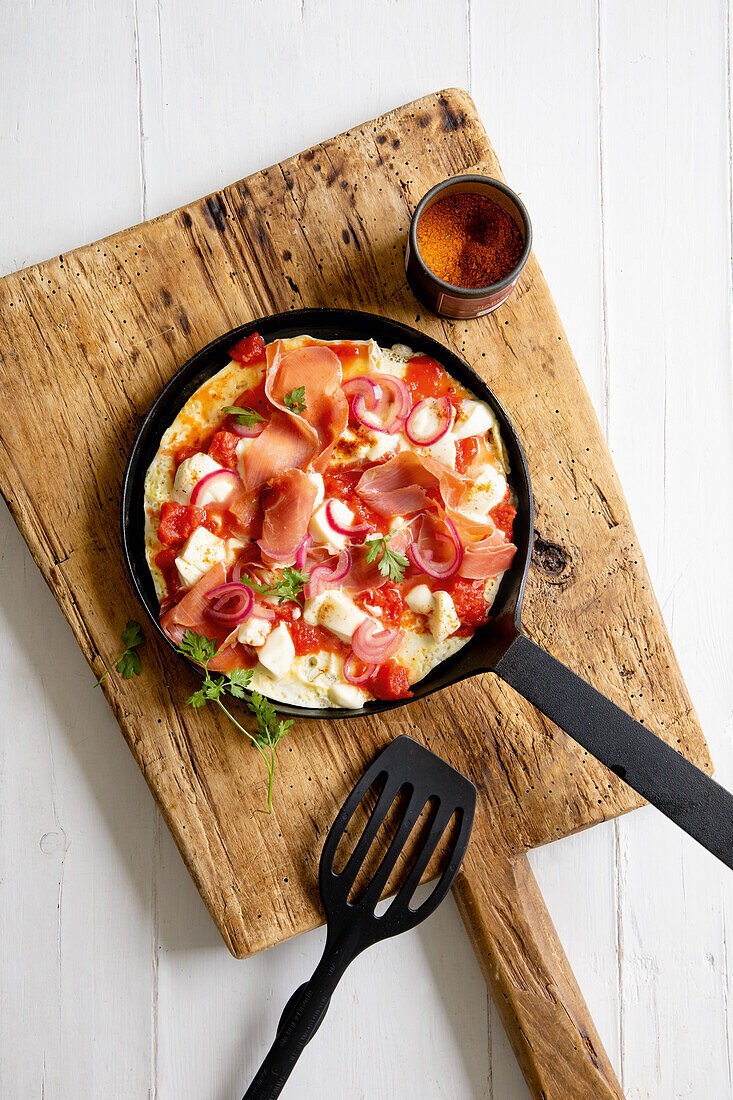 Omelette pizza with Serrano ham