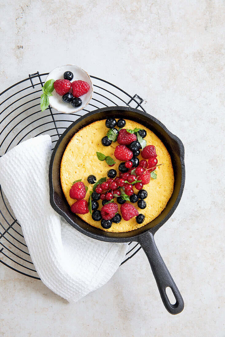 Curd omelette with berries and basil