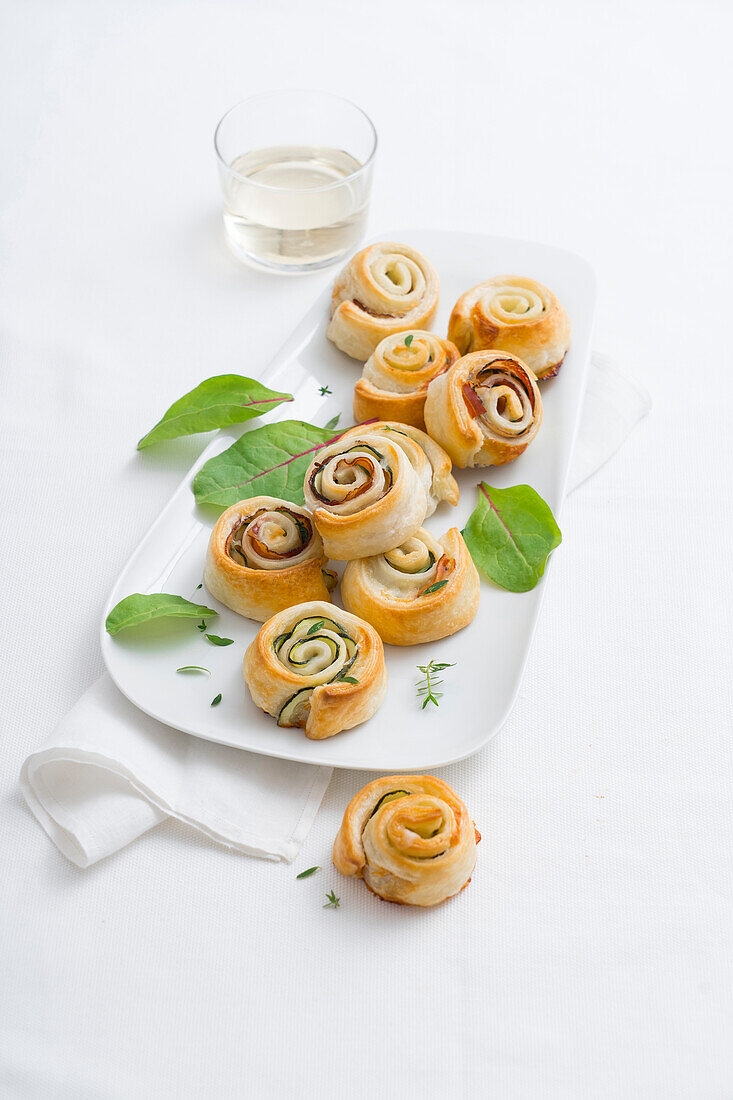 Baked cheese buns with bacon and courgettes