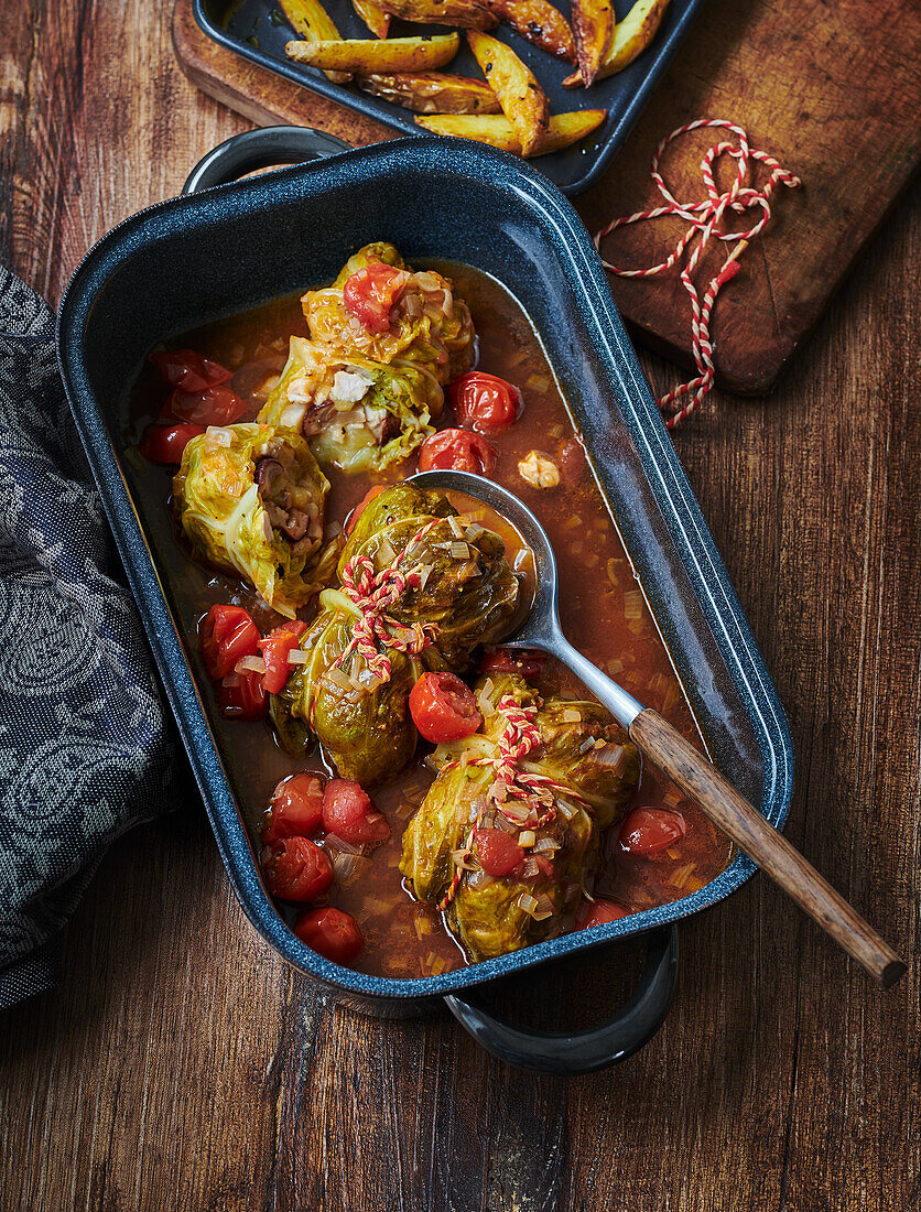 Savoy cabbage roulades with turkey and porcini mushroom stuffing