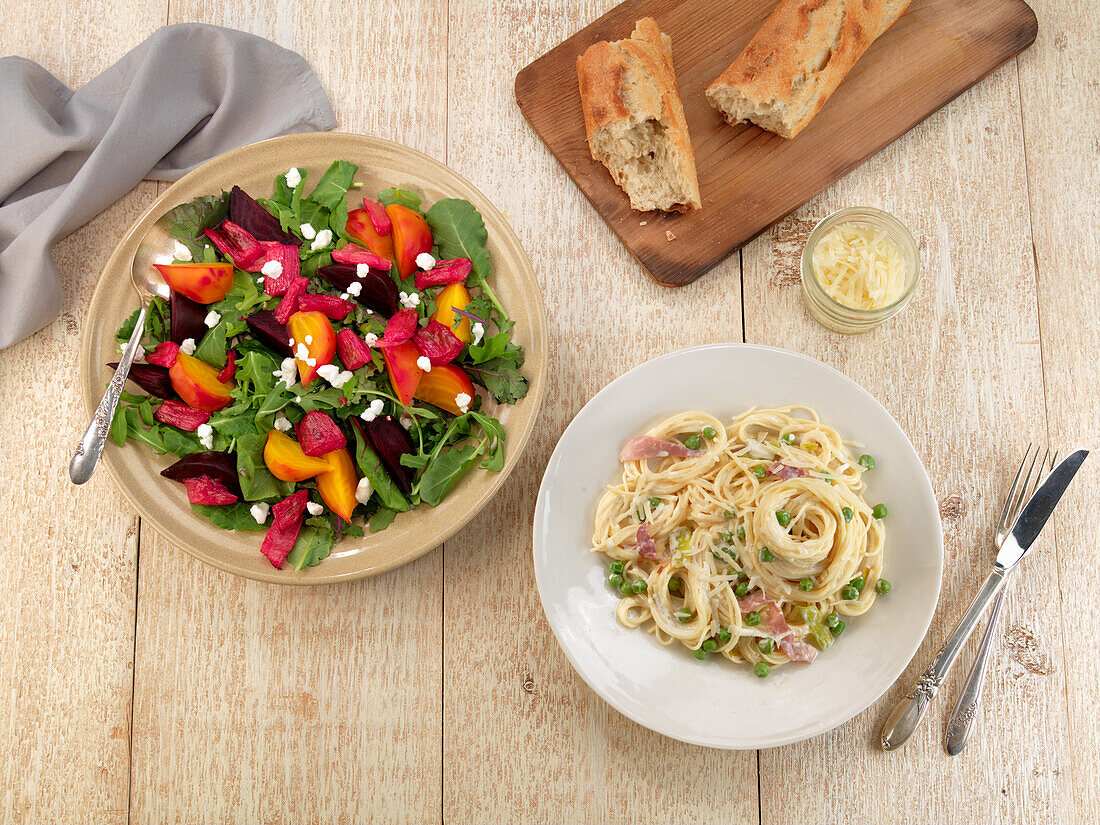 Pasta with peas, leek and ham served with a colourful beetroot salad
